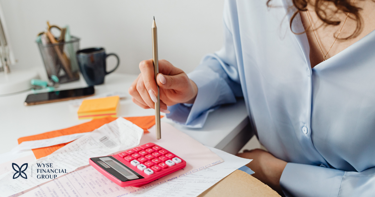 Woman using calculator
